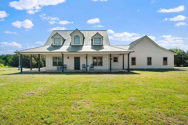 47.6 Acres of Land with Home for Sale in Wolfe City, Texas