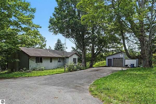 2 Acres of Land with Home for Sale in Benzonia, Michigan