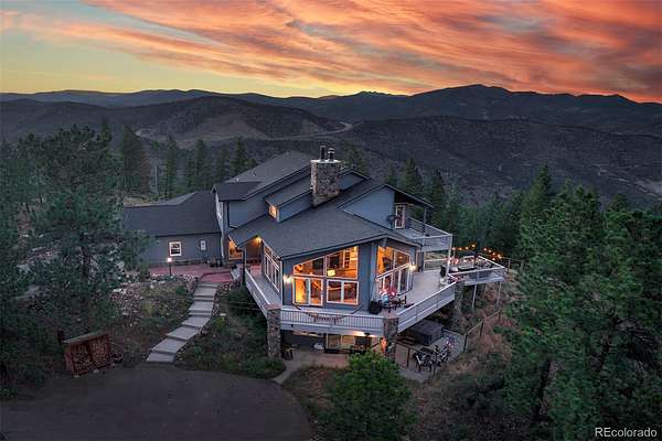 4.7 Acres of Land with Home for Sale in Evergreen, Colorado