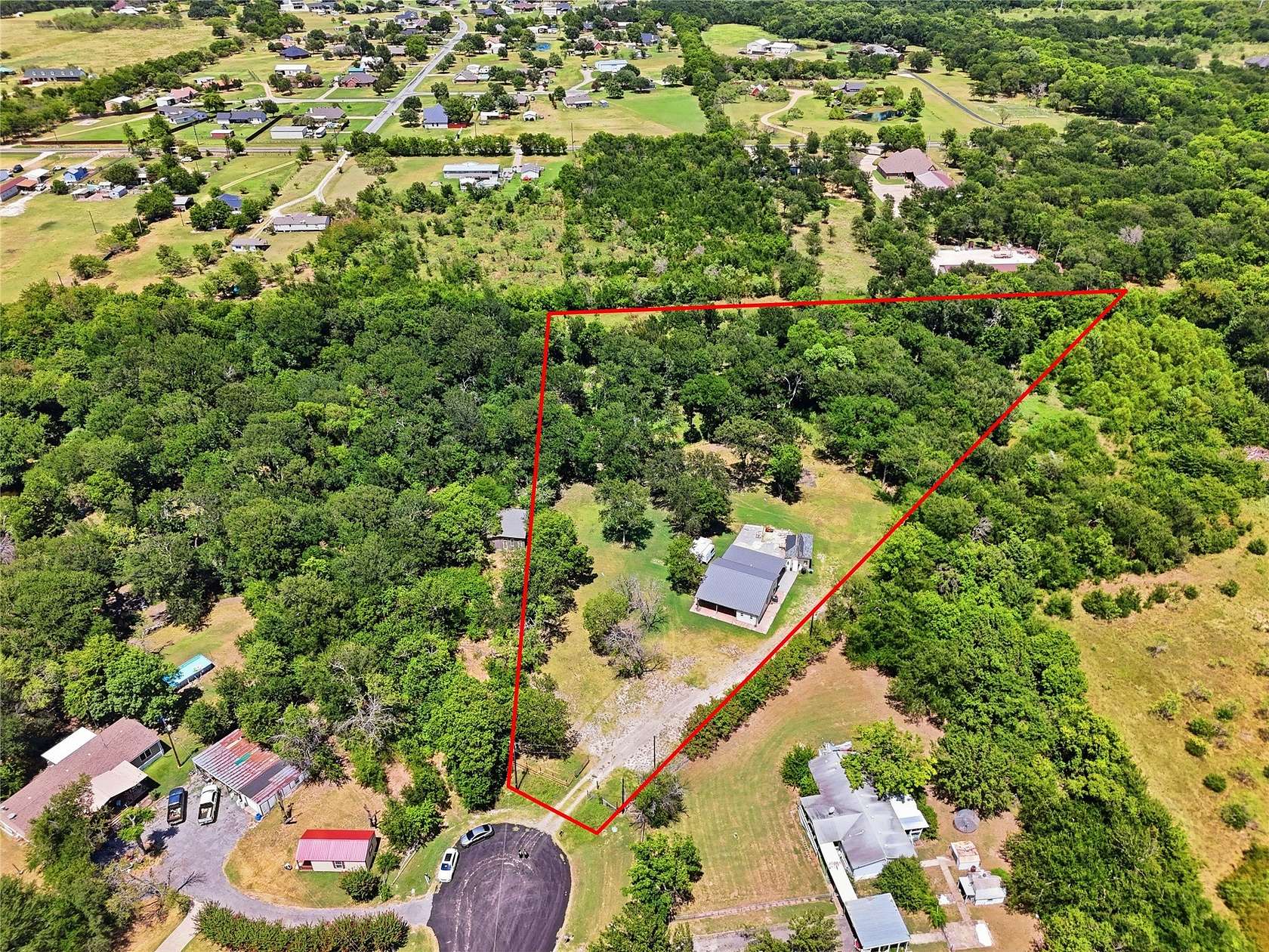 3.3 Acres of Land with Home for Sale in Royse City, Texas