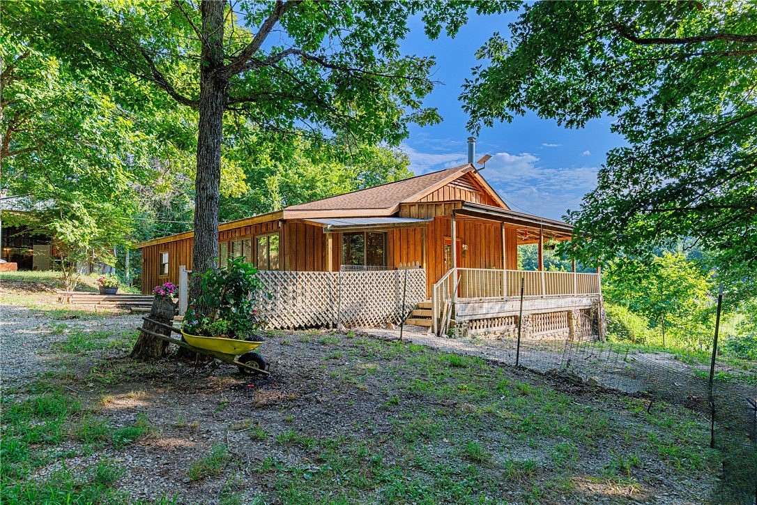 10.6 Acres of Land with Home for Sale in Yellville, Arkansas