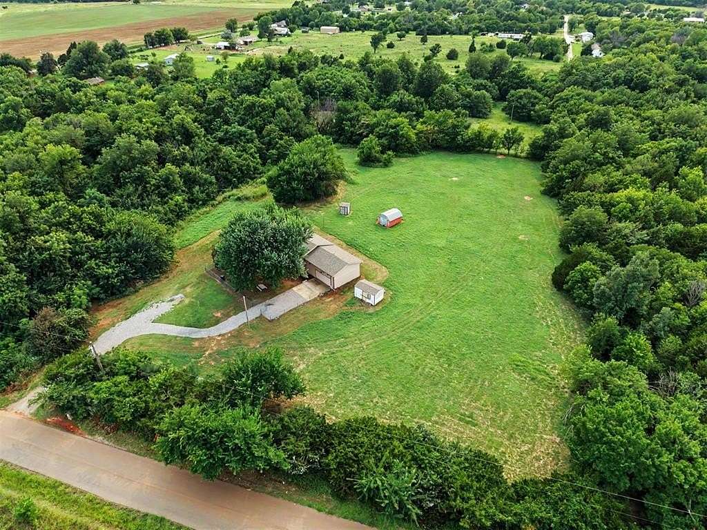 5 Acres of Land with Home for Sale in Edmond, Oklahoma