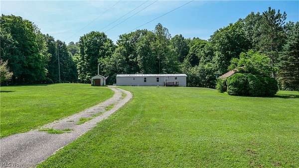 2 Acres of Land with Home for Sale in Deerfield, Ohio