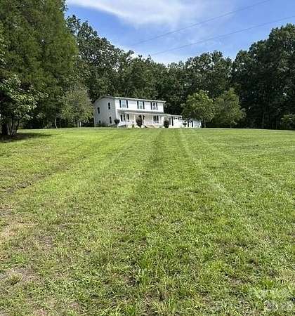 11.4 Acres of Land with Home for Sale in Norwood, North Carolina