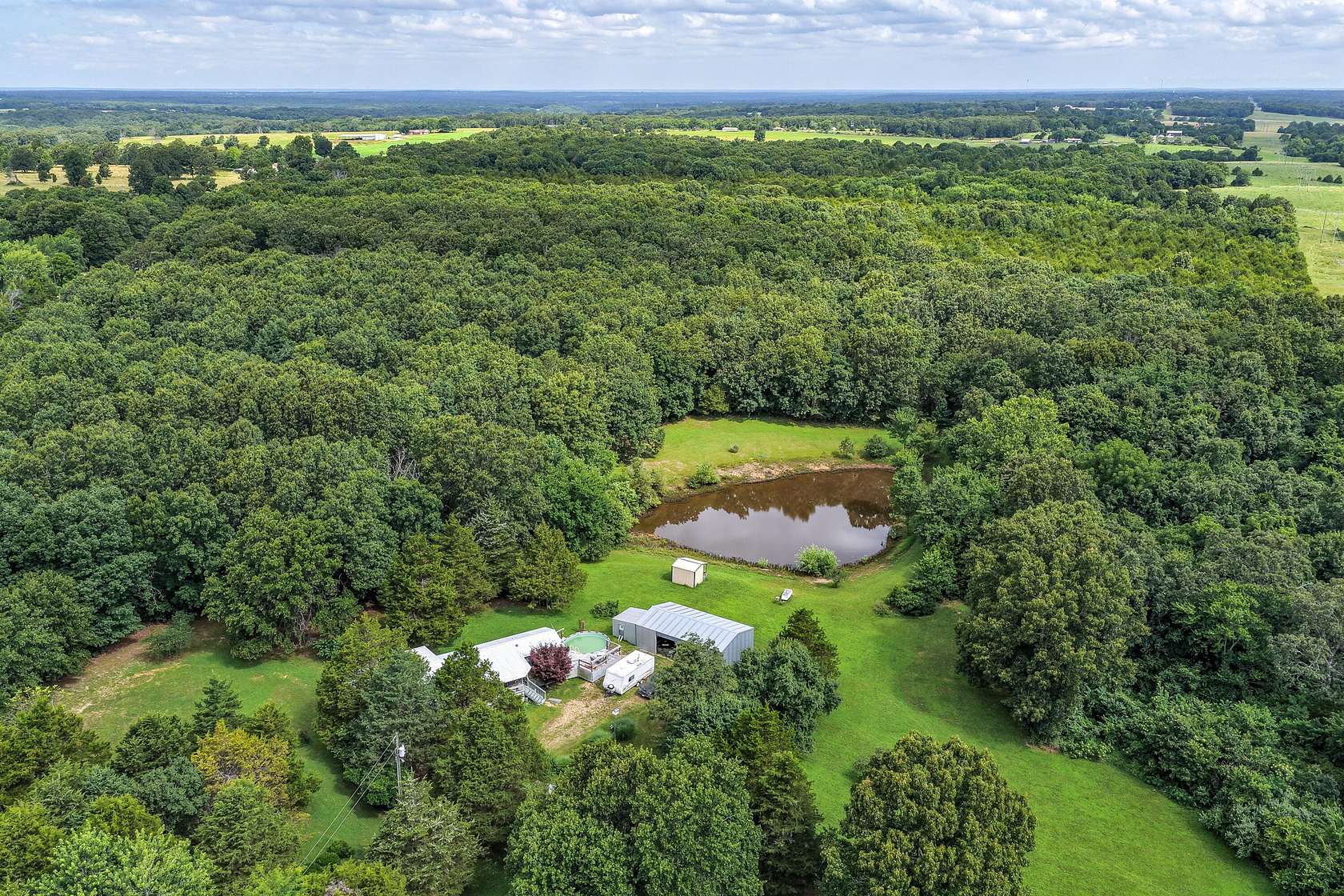 23.9 Acres of Land with Home for Sale in Hartville, Missouri
