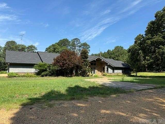 10.7 Acres of Land with Home for Sale in Stephens, Arkansas