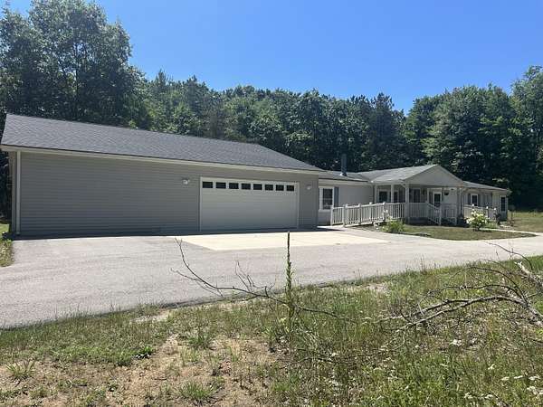 13.6 Acres of Land with Home for Sale in White Cloud, Michigan