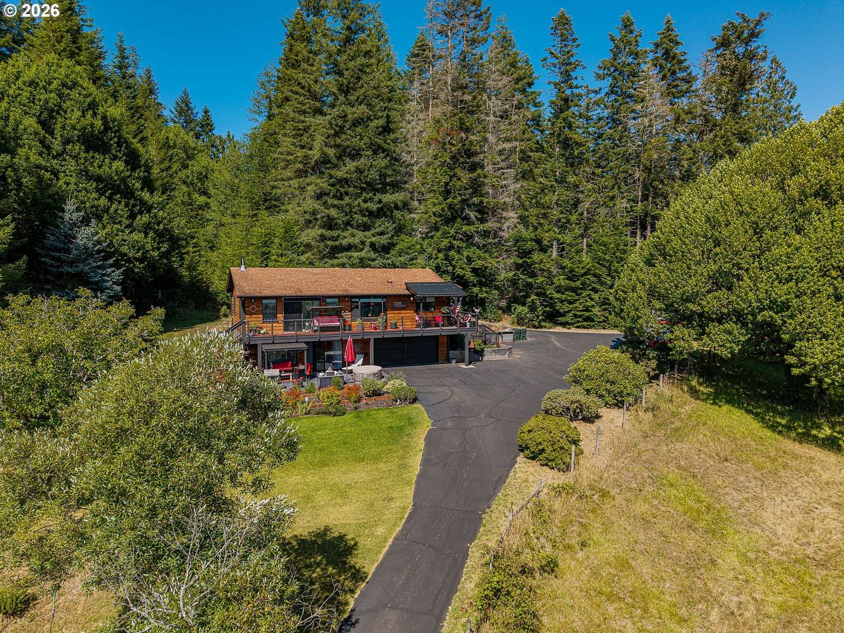 7.62 Acres of Land with Home for Sale in Coquille, Oregon