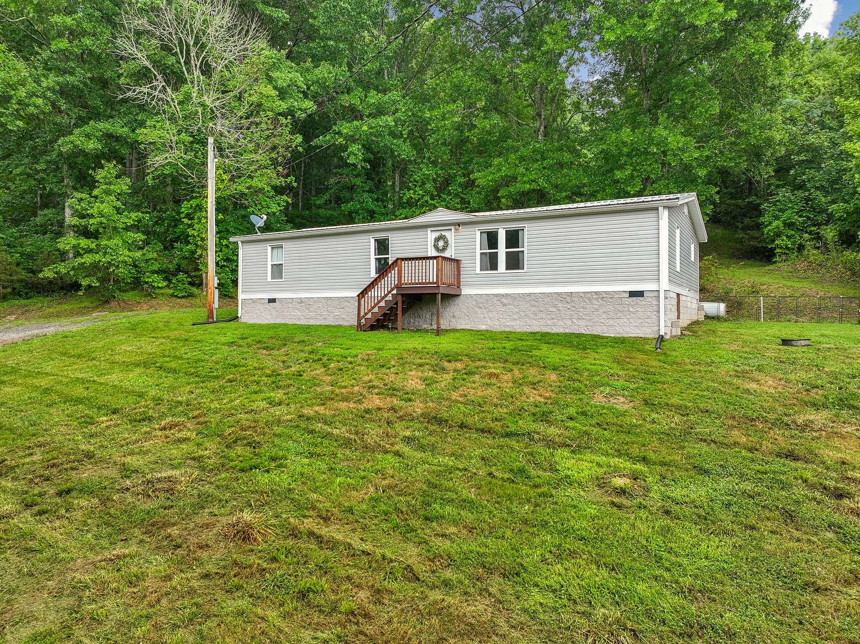 5.73 Acres of Land with Home for Sale in Gordonsville, Tennessee