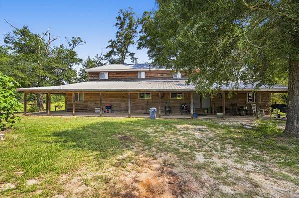 80 Acres of Agricultural Land with Home for Sale in Hacoda, Alabama