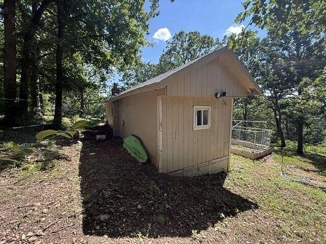 0.87 Acres of Land with Home for Sale in Fair Grove, Missouri