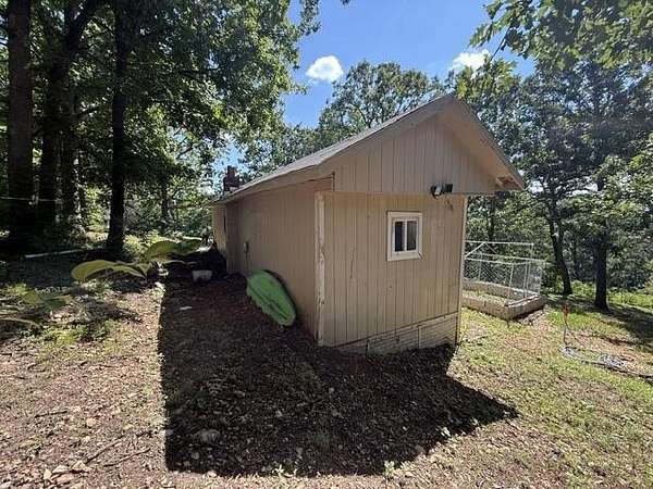 0.87 Acres of Land with Home for Sale in Fair Grove, Missouri