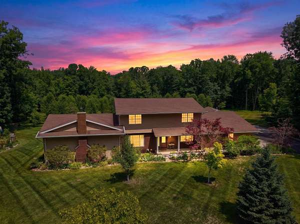 10.2 Acres of Land with Home for Sale in Sanford, Michigan
