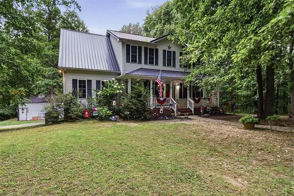 4.6 Acres of Land with Home for Sale in Scottsville, Kentucky