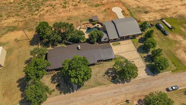 12.6 Acres of Land with Home for Sale in Paducah, Texas