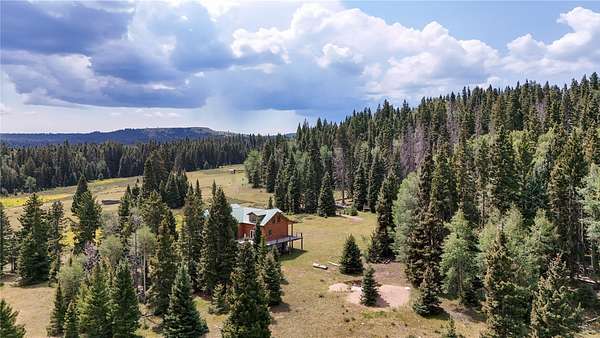 2,295 Acres of Land with Home for Sale in Tres Piedras, New Mexico