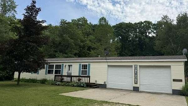 7.73 Acres of Land with Home for Sale in Hopkins, Michigan