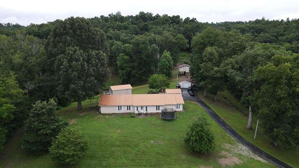 8.34 Acres of Land with Home for Sale in Louisa, Kentucky