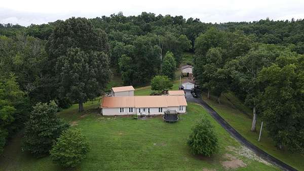 8.34 Acres of Land with Home for Sale in Louisa, Kentucky