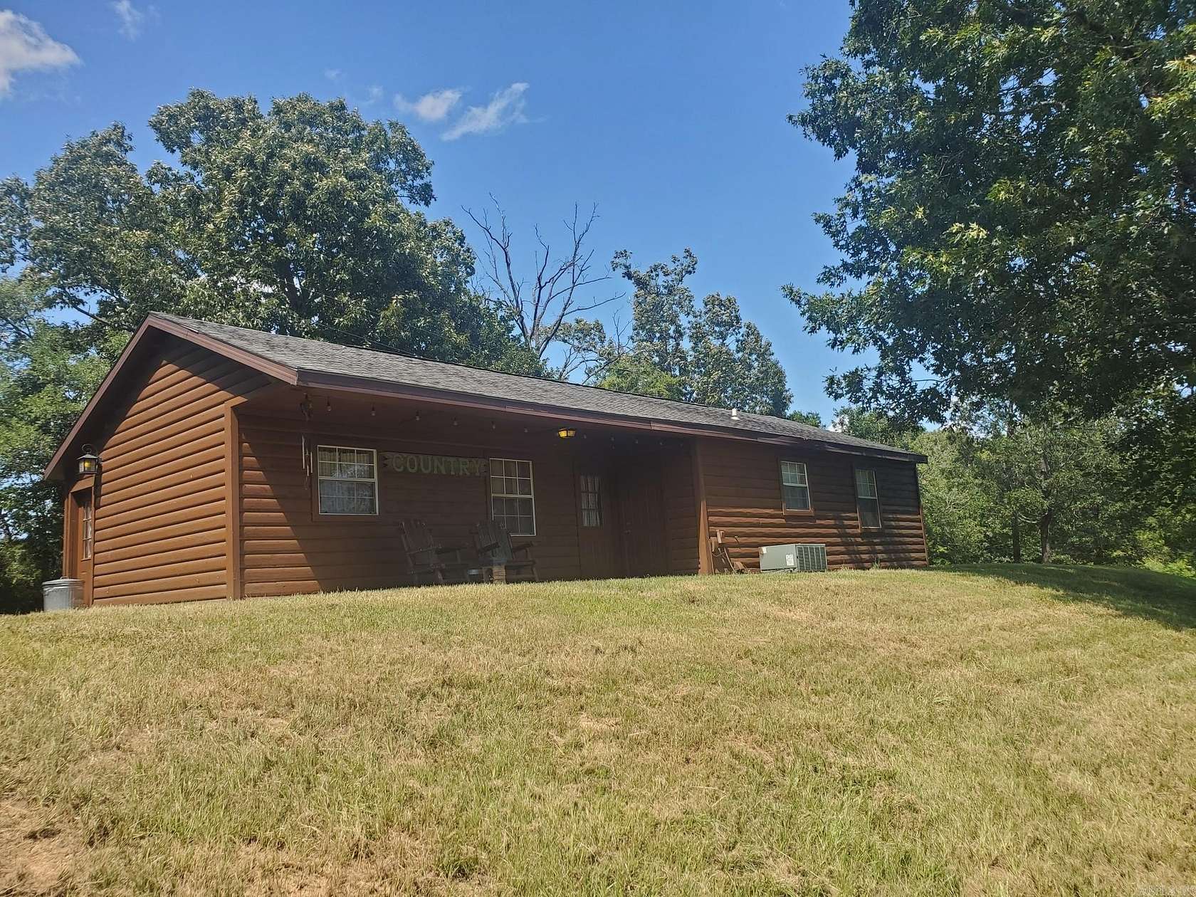 3.33 Acres of Land with Home for Sale in Cove, Arkansas
