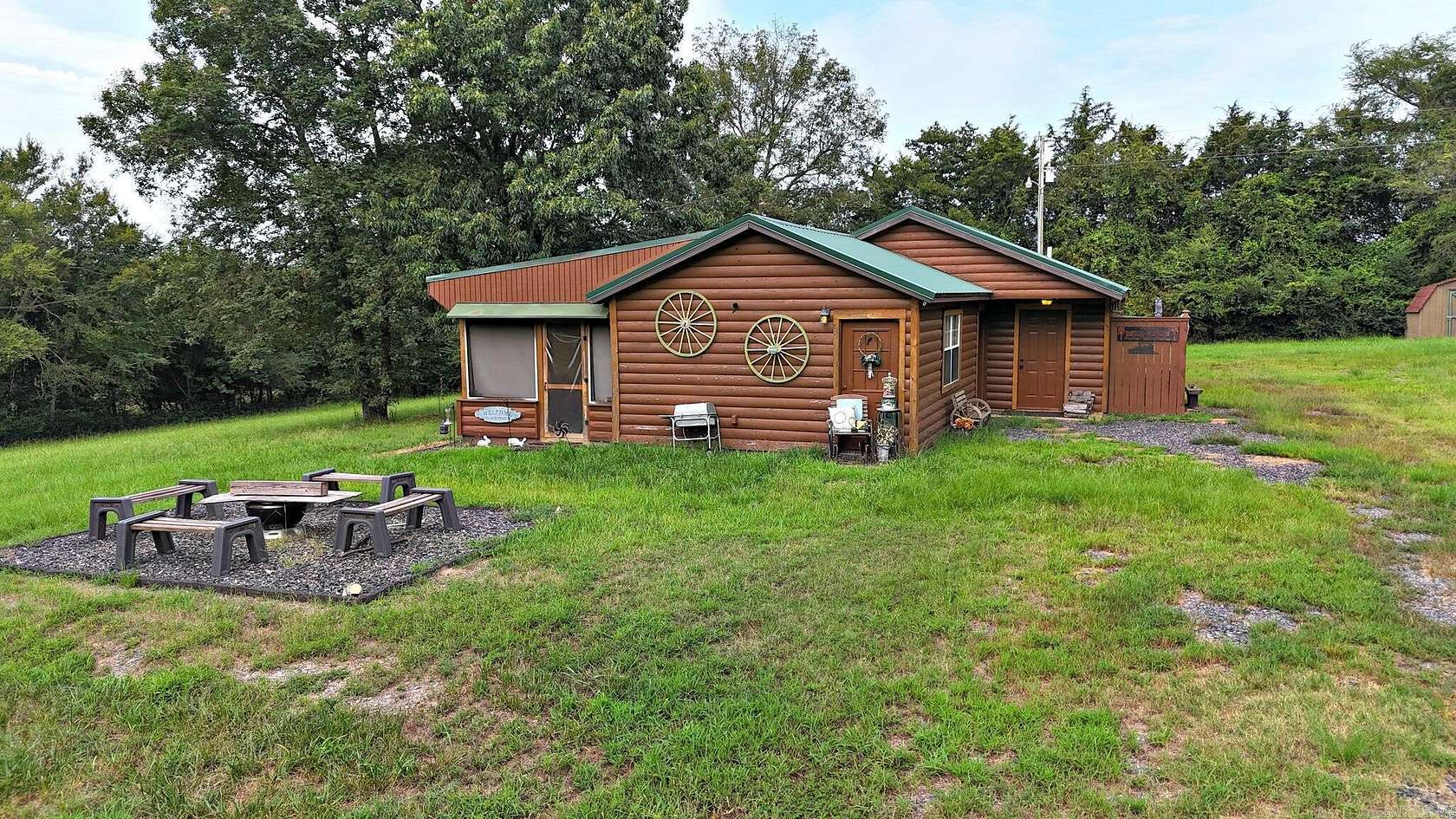 3.33 Acres of Land with Home for Sale in Cove, Arkansas