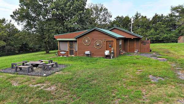 3.33 Acres of Land with Home for Sale in Cove, Arkansas