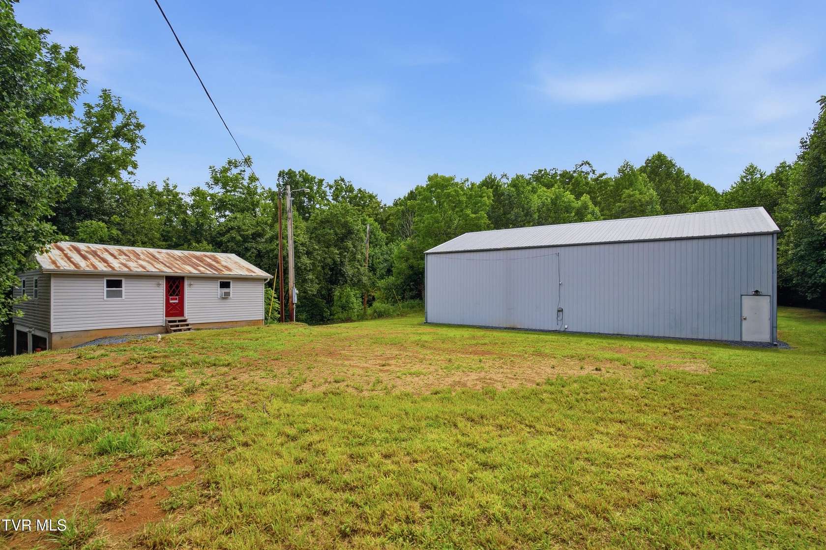 2.64 Acres of Land with Home for Sale in Roan Mountain, Tennessee
