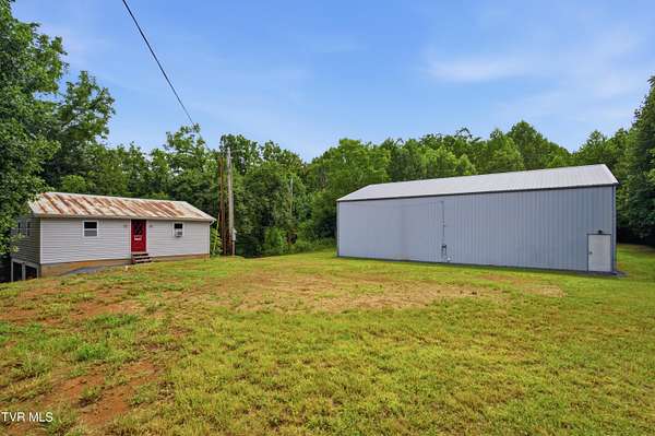 2.64 Acres of Land with Home for Sale in Roan Mountain, Tennessee