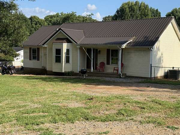 1.5 Acres of Land with Home for Sale in Woodlawn, Tennessee