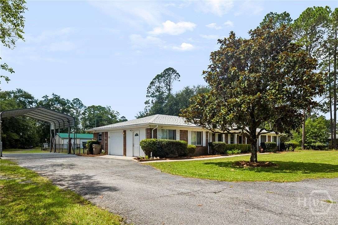 1.5 Acres of Land with Home for Sale in Rincon, Georgia