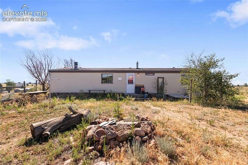 5 Acres of Land with Home for Sale in Peyton, Colorado