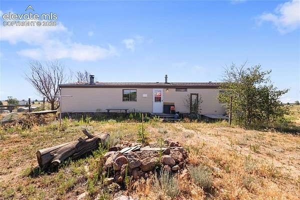 5 Acres of Land with Home for Sale in Peyton, Colorado