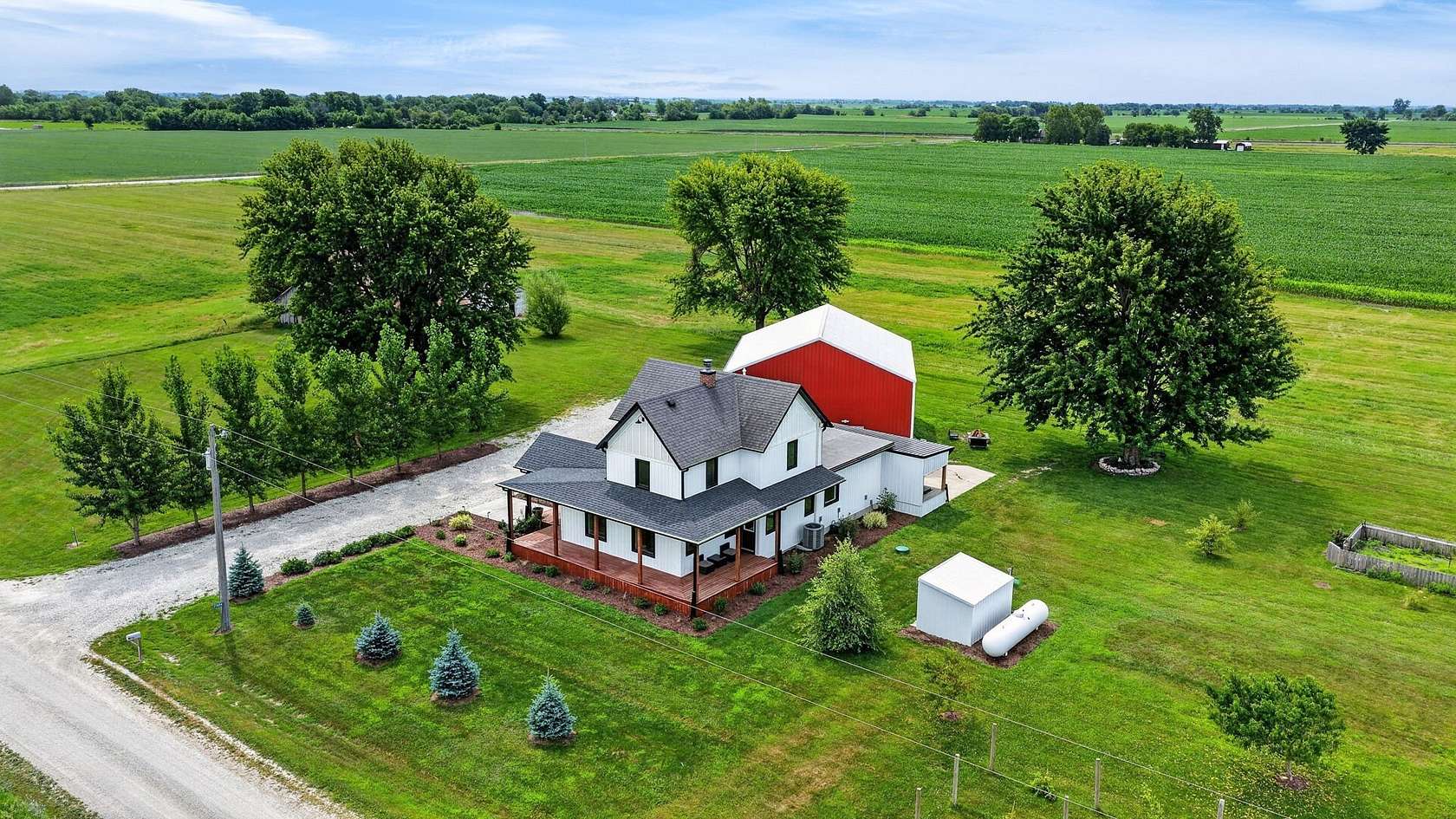 11.8 Acres of Land with Home for Sale in Russell, Iowa