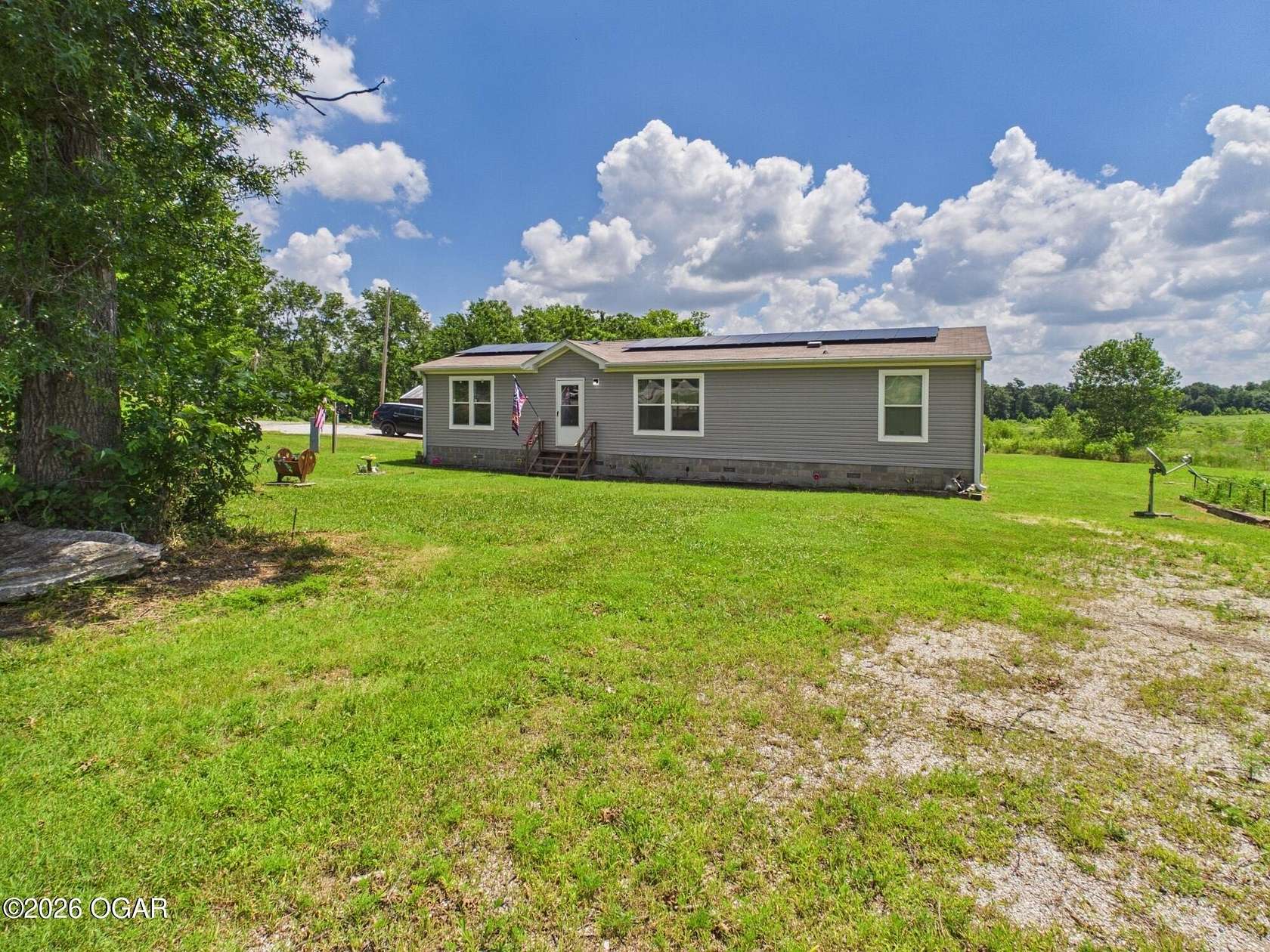 5 Acres of Land with Home for Sale in Neck City, Missouri