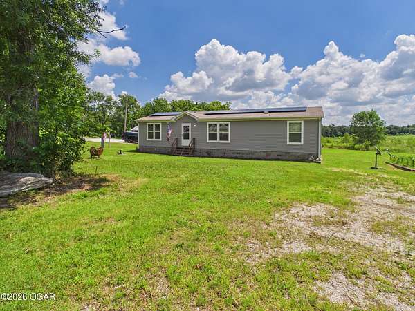 5 Acres of Land with Home for Sale in Neck City, Missouri