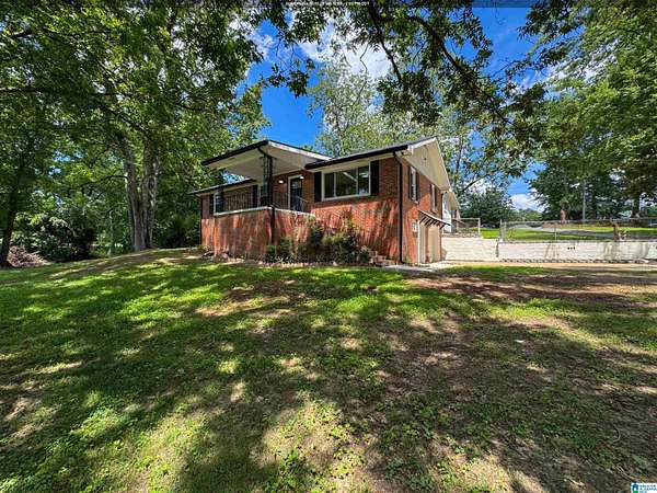 1.55 Acres of Land with Home for Sale in Dora, Alabama