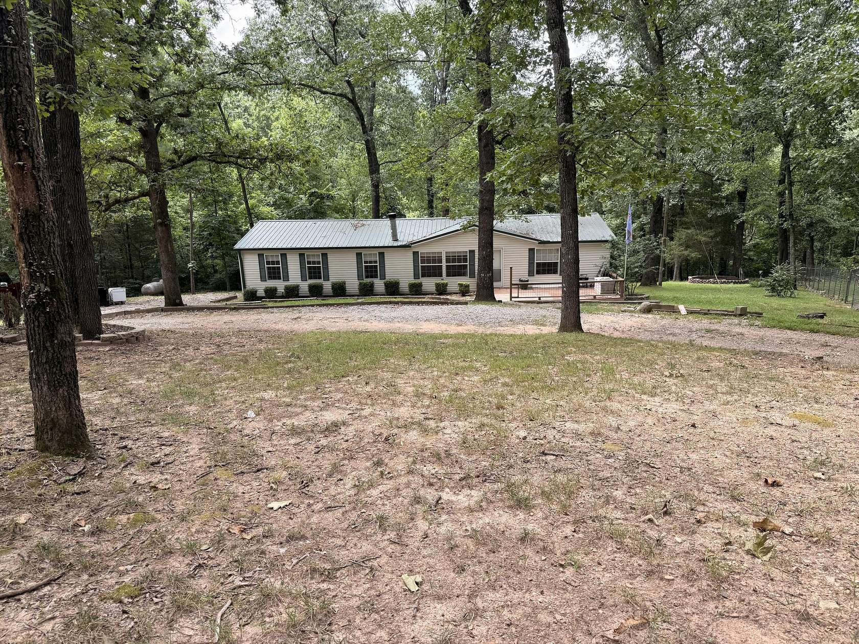 6.3 Acres of Land with Home for Sale in Pineville, Missouri