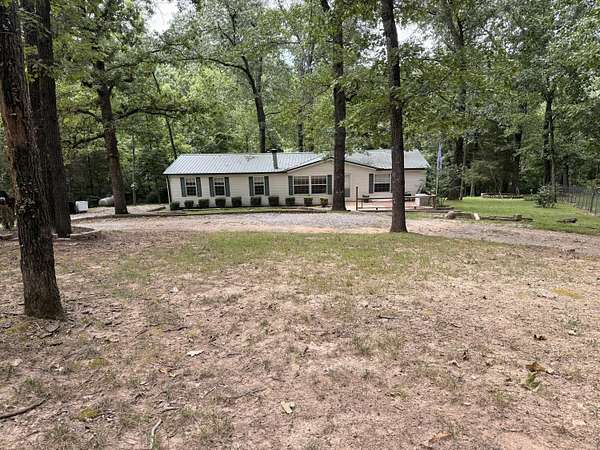 6.3 Acres of Land with Home for Sale in Pineville, Missouri
