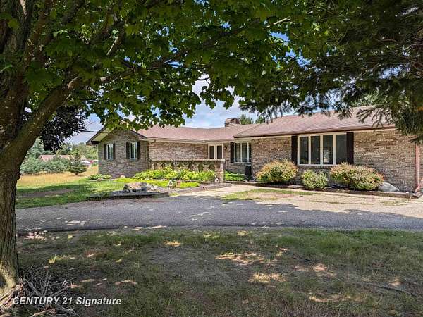 10 Acres of Land with Home for Sale in Owosso, Michigan
