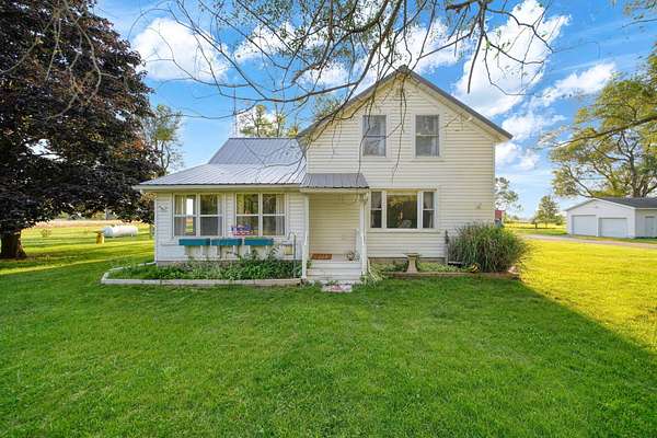 2 Acres of Land with Home for Sale in Cement City, Michigan