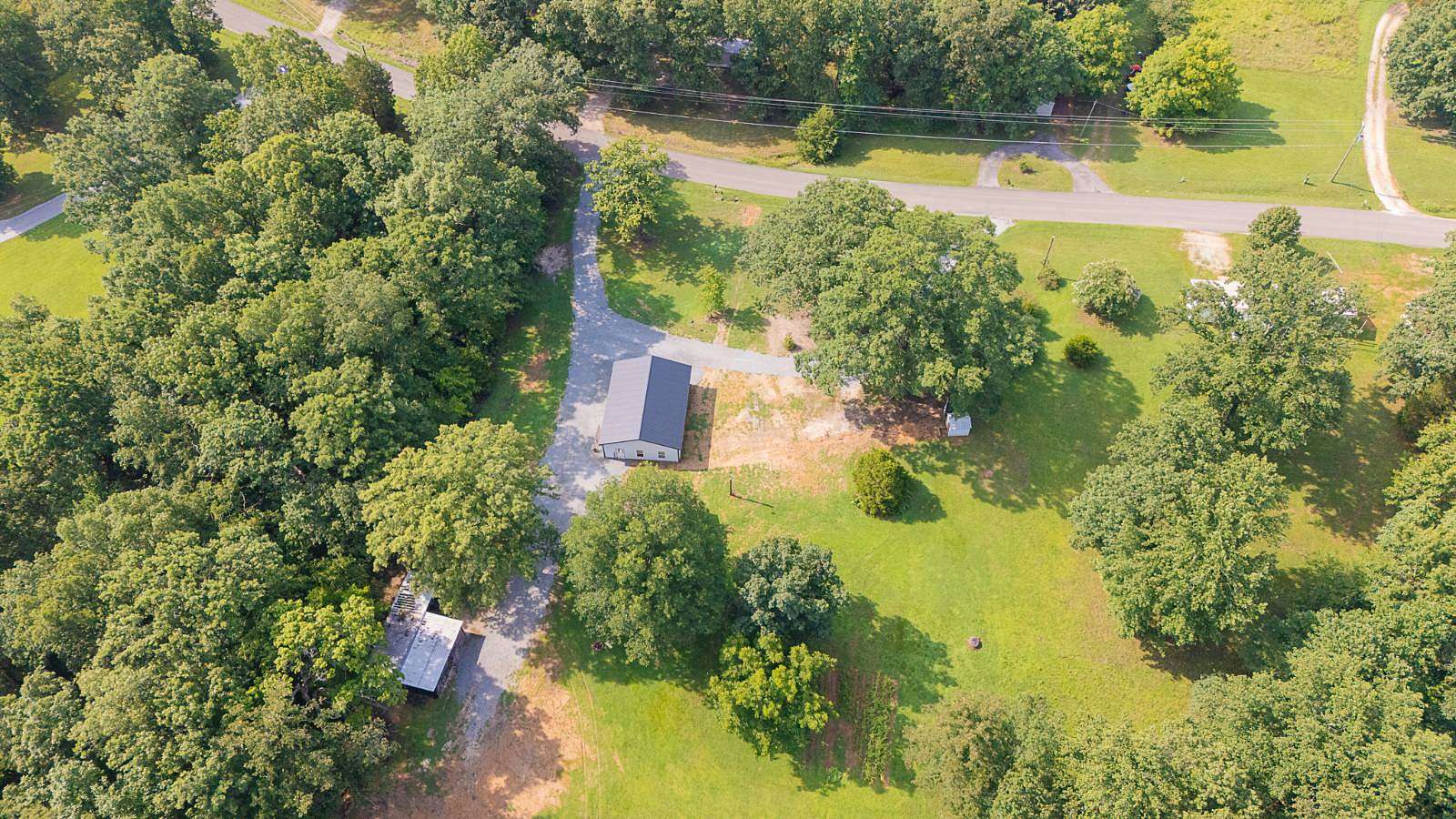 7 Acres of Land with Home for Sale in Big Sandy, Tennessee