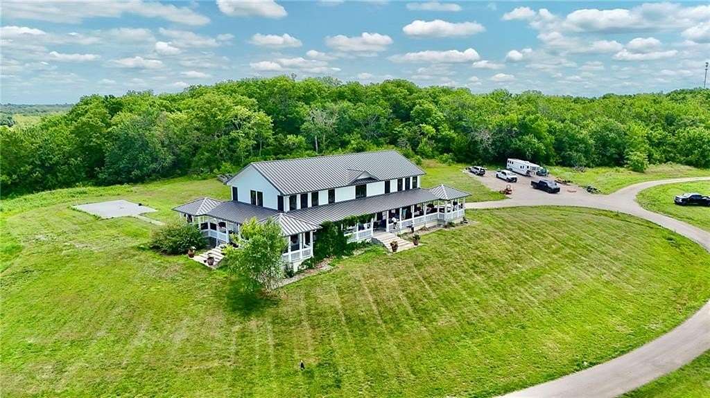 77 Acres of Land with Home for Sale in Paola, Kansas