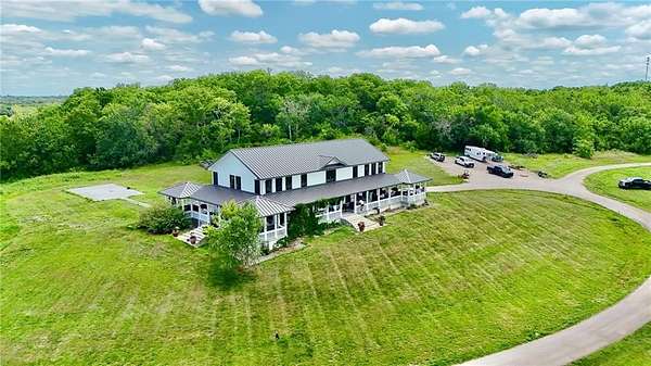 77 Acres of Land with Home for Sale in Paola, Kansas