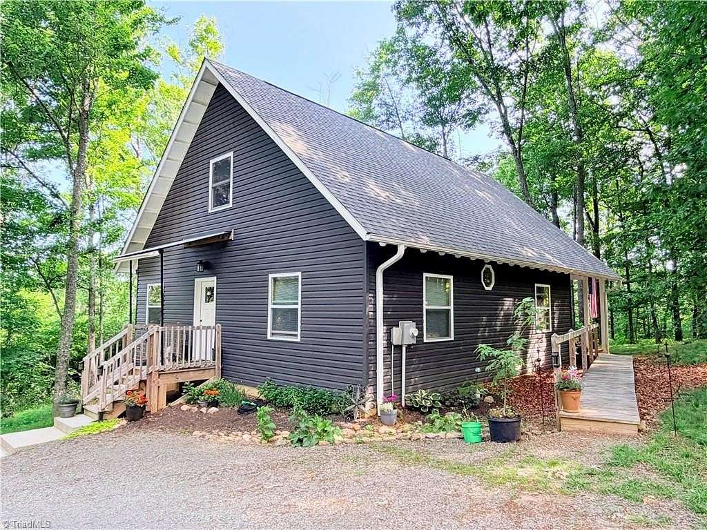 2.24 Acres of Land with Home for Sale in Ennice, North Carolina