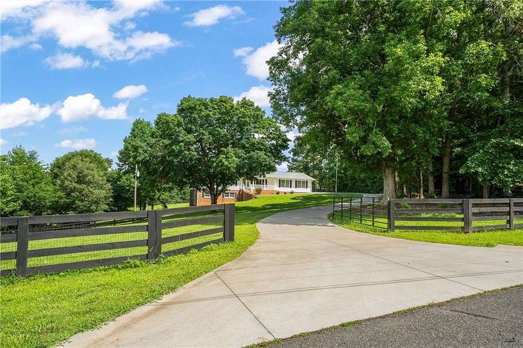 7.82 Acres of Land with Home for Sale in Canton, Georgia