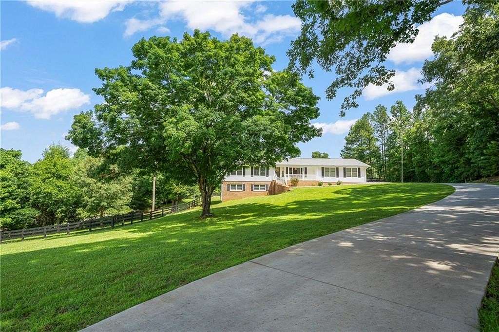 7.82 Acres of Land with Home for Sale in Canton, Georgia
