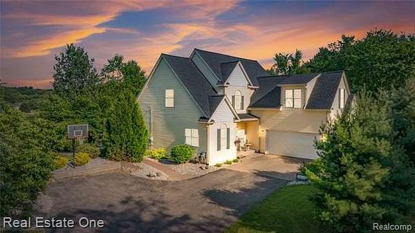 2.36 Acres of Land with Home for Sale in Holly Township, Michigan
