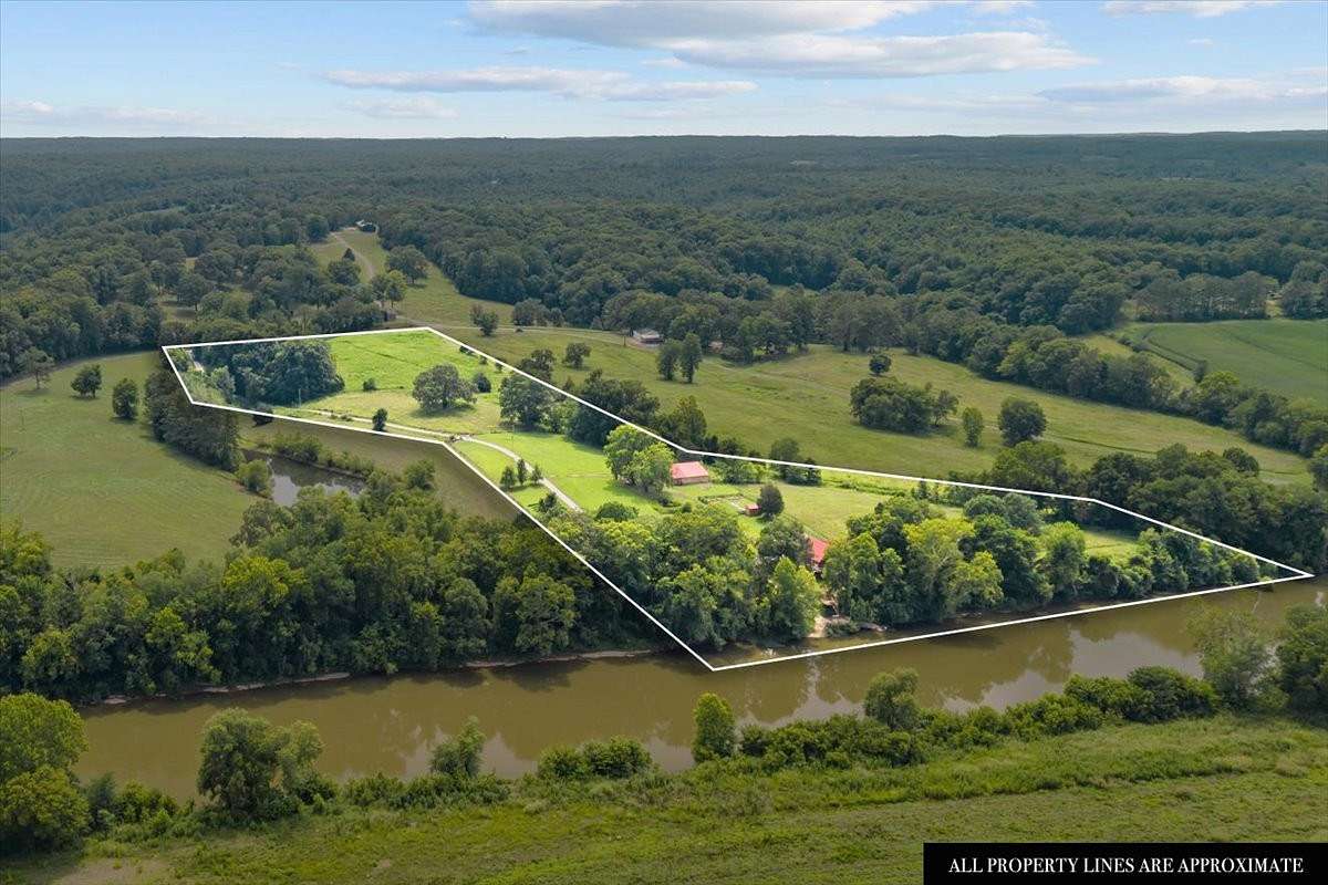 13.9 Acres of Land with Home for Sale in Hurricane Mills, Tennessee