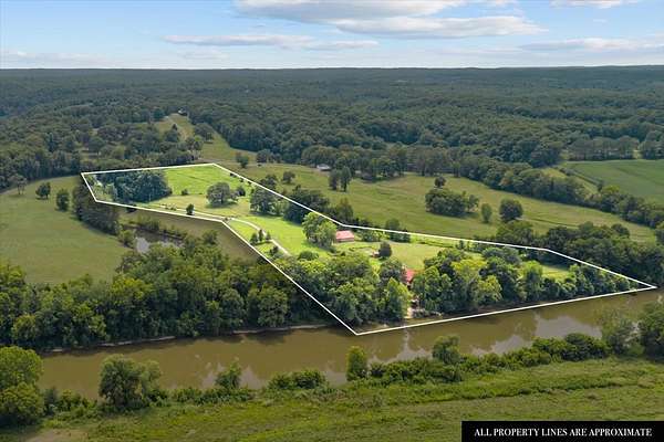 13.9 Acres of Land with Home for Sale in Hurricane Mills, Tennessee
