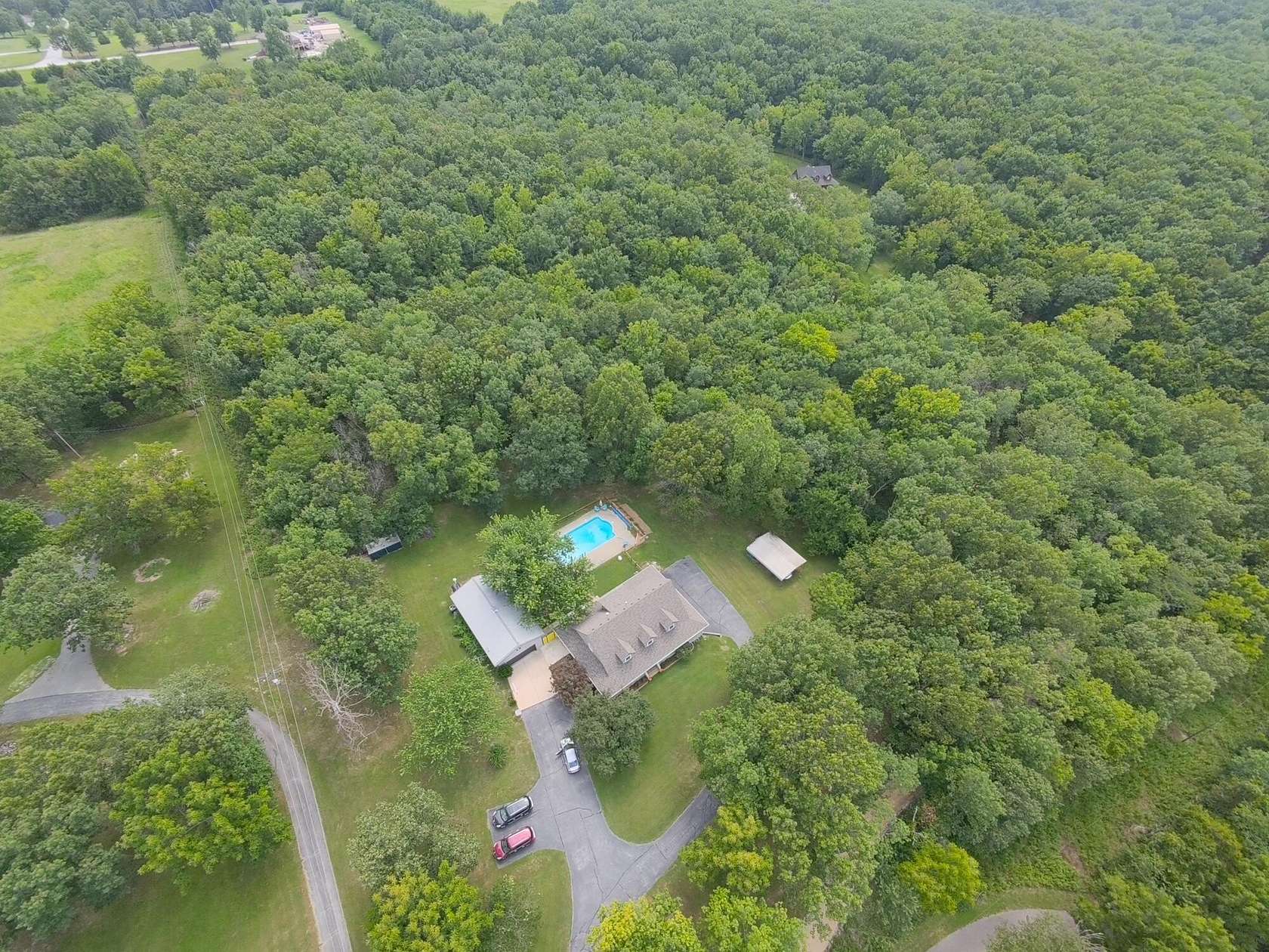 10 Acres of Recreational Land with Home for Sale in Springfield, Missouri
